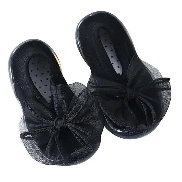 Toddler Shoes by MANDOTOS featuring soft fabric upper, slip-on design, and colorful playful pattern for young children.