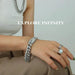 Mandotos TOSOKO 18K gold-plated Cuban chain set with sparkling zircon stones, showcasing a luxurious jewelry design.