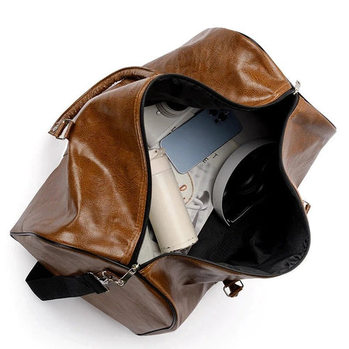 Mandotos travel bag for men and women, large capacity PU leather shoulder bag with duffle and crossbody design for sports and travel.