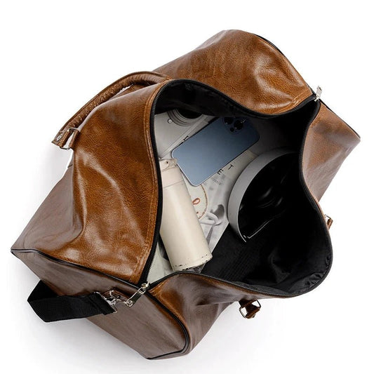 Mandotos travel bag for men and women, large capacity PU leather shoulder bag with duffle and crossbody design for sports and travel.