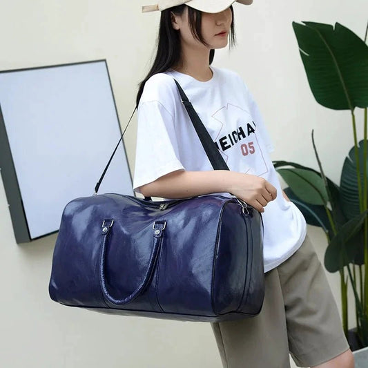 Mandotos men's travel bag made of PU leather with shoulder strap, large capacity tote, duffle, crossbody style, suitable for sports or luggage.