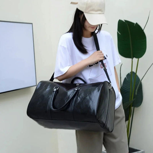 Mandotos travel bag for men and women, large capacity PU leather shoulder tote, duffle, crossbody, sports pack, luggage.