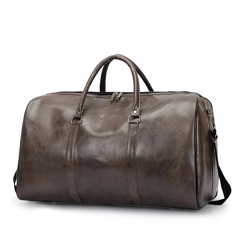 Mandotos travel bag for men and women, made of PU leather, featuring a large capacity, shoulder strap, and stylish duffle design.