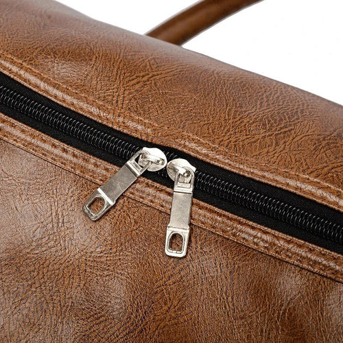 Mandotos PU leather travel bag with large capacity, shoulder strap, and versatile design for men and women, ideal for sports and luggage.