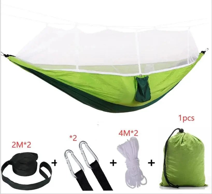 Mandotos Traveler's Mosquito-Free Hammock hanging outdoors with mesh sides and sturdy straps for comfortable, bug-free relaxation