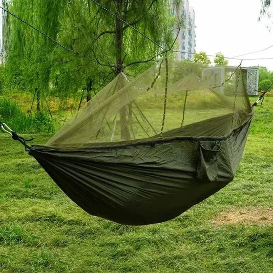 Mandotos Traveler's Mosquito-Free Hammock with built-in net, lightweight outdoor camping hammock for insect-free relaxation.
