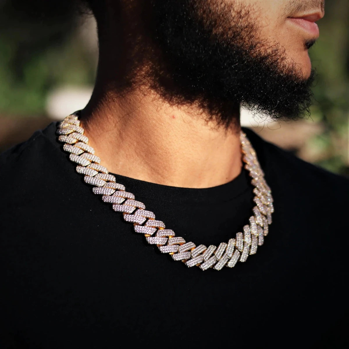 Mandotos triple row diamond gold Cuban chain featuring sparkling diamonds and a bold, luxurious design.