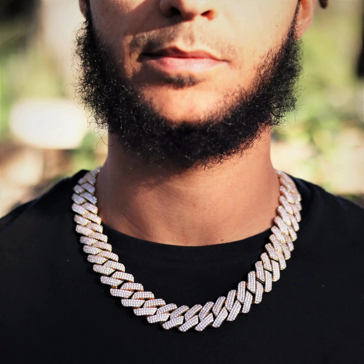 Mandotos triple row diamond gold Cuban chain with sparkling diamonds and thick Cuban link design, luxurious jewelry accessory.