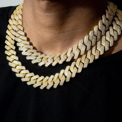 Mandotos triple row diamond gold Cuban chain with interlocking links and sparkling diamond accents.