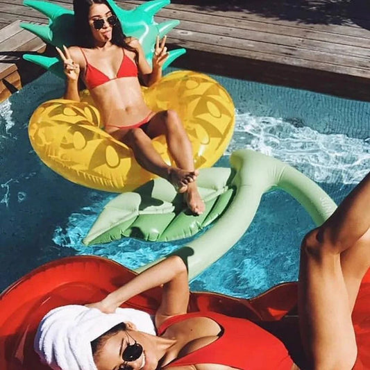 Colorful tropical pineapple water float by MANDOTOS, featuring a vibrant pineapple design perfect for pool and beach fun.