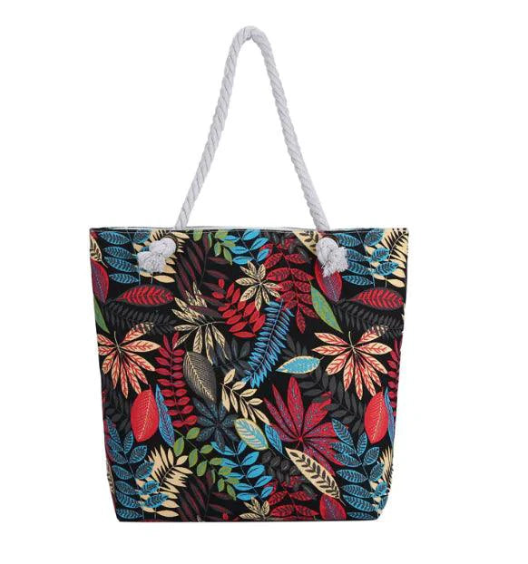 Twin-sided artistic canvas bag by MANDOTOS with colorful abstract designs, sturdy handles, and spacious interior for everyday use.