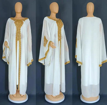 Mandotos two-piece gold kaftan abaya dress set with flowing fabric and elegant design, ideal for stylish occasions.