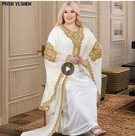 Mandotos two-piece gold kaftan abaya dress with intricate detailing, flowing fabric, and elegant design for stylish wear.