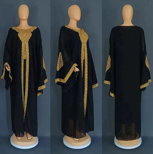 Mandotos two-piece gold kaftan abaya dress set featuring elegant flowing fabric and intricate detailing for a stylish look.