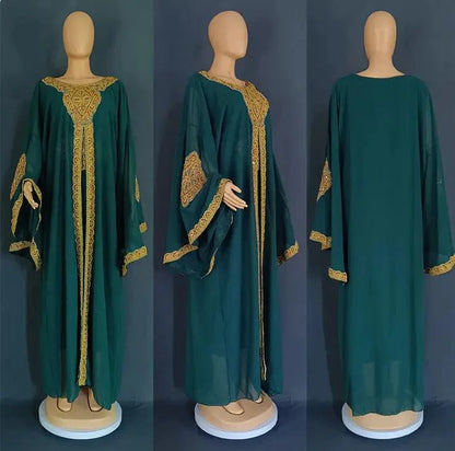 Mandotos two-piece gold kaftan abaya set with intricate embroidery and flowing fabric, perfect for elegant traditional wear.