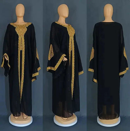 Mandotos two-piece gold kaftan abaya dress with flowing fabric and elegant design, perfect for stylish modest wear.