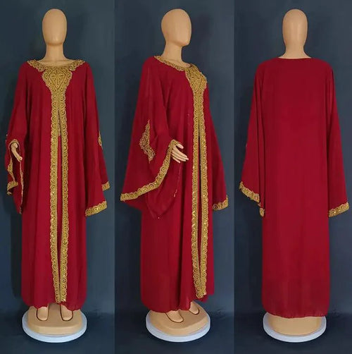 Mandotos two-piece gold kaftan abaya dress with flowing fabric and elegant design, perfect for special occasions and traditional wear.