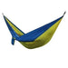 Mandotos Ultimate Oasis single and double hammock with colorful woven fabric and wooden spreader bars, ideal for relaxing outdoors.