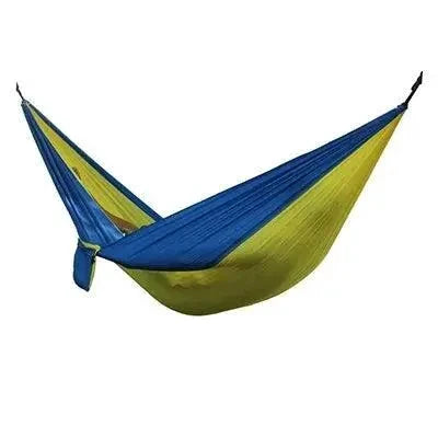 Mandotos Ultimate Oasis single and double hammock with colorful woven fabric and wooden spreader bars, ideal for relaxing outdoors.