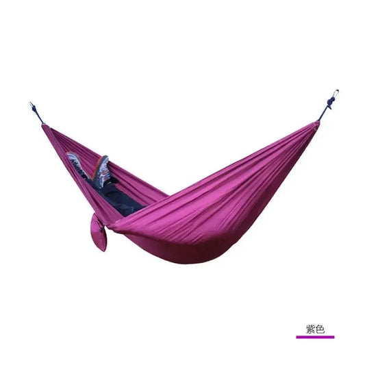 Mandotos Ultimate Oasis single and double hammock with sturdy fabric and wooden spreader bars for outdoor relaxation.