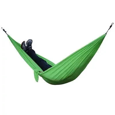 Mandotos Ultimate Oasis single and double hammock shown in natural fabric with wooden spreader bars, designed for outdoor relaxation.