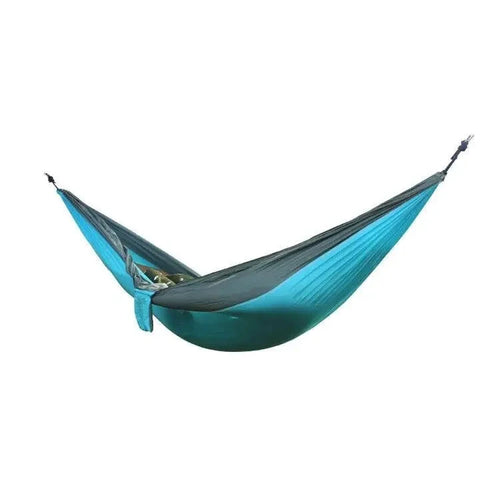 Mandotos Ultimate Oasis single and double hammock with sturdy fabric and wooden spreader bars, perfect for relaxing outdoors.
