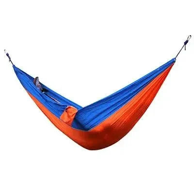Mandotos Ultimate Oasis single and double hammock with sturdy fabric and wooden spreader bars, perfect for relaxing outdoors.