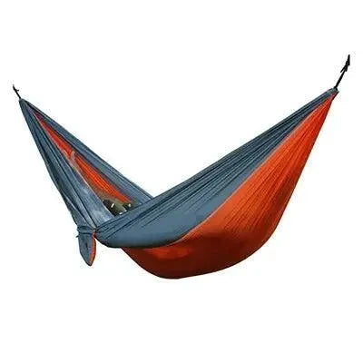Mandotos Ultimate Oasis single and double hammock with sturdy fabric and wooden spreader bars for relaxing outdoors.