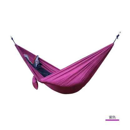 Mandotos Ultimate Oasis single and double hammock with durable fabric and wooden spreader bars, perfect for relaxing outdoors.