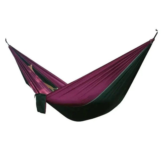 Mandotos Ultimate Oasis single and double hammock with sturdy fabric and wooden spreader bars, perfect for relaxing outdoors.