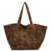Urban Leopard Canvas Tote by MANDOTOS featuring a stylish leopard print design on durable canvas fabric.