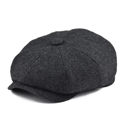 Vintage Peaky Blinder woolen cap by MANDOTOS, shown in dark tweed fabric with a curved brim and classic styling.