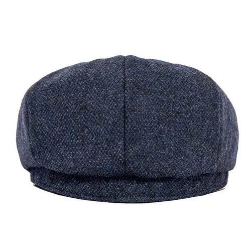 Vintage Peaky Blinder woolen cap by MANDOTOS, showing a classic textured wool hat with a brim and retro style.