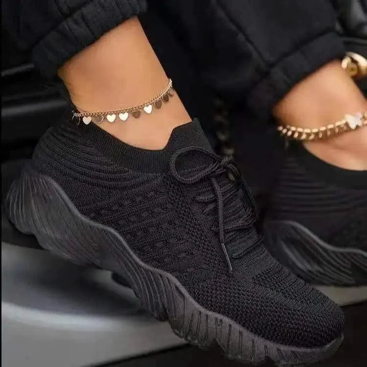 Mandotos walking shoes in gray with white soles, featuring breathable mesh upper and cushioned insoles for comfortable walking.