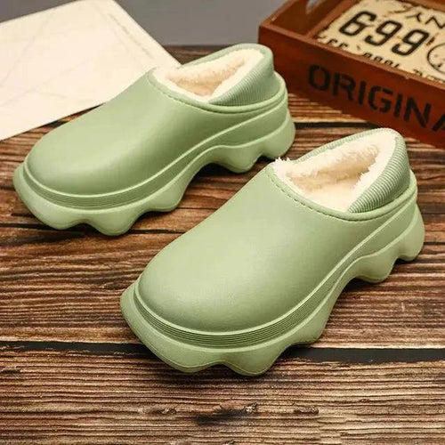 Mandotos warm outdoor shoes with insulated lining and durable soles, designed for outdoor adventures in cold weather.