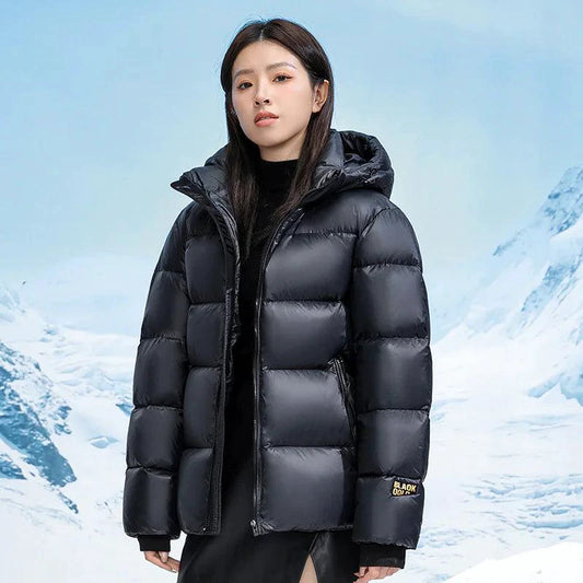 Mandotos winter black and gold down jacket for couples, featuring a stylish, insulated design and modern fit.