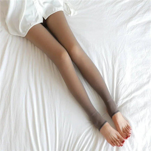Mandotos winter warmth high waist thermal tights showing a close-up of black, slim fit, and cozy fabric for cold weather comfort.