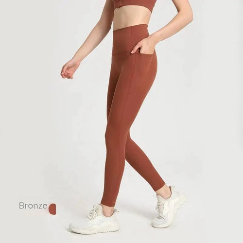 Mandotos women's Dual-Comfort athletic pants showing a relaxed fit with elastic waistband and sporty design.
