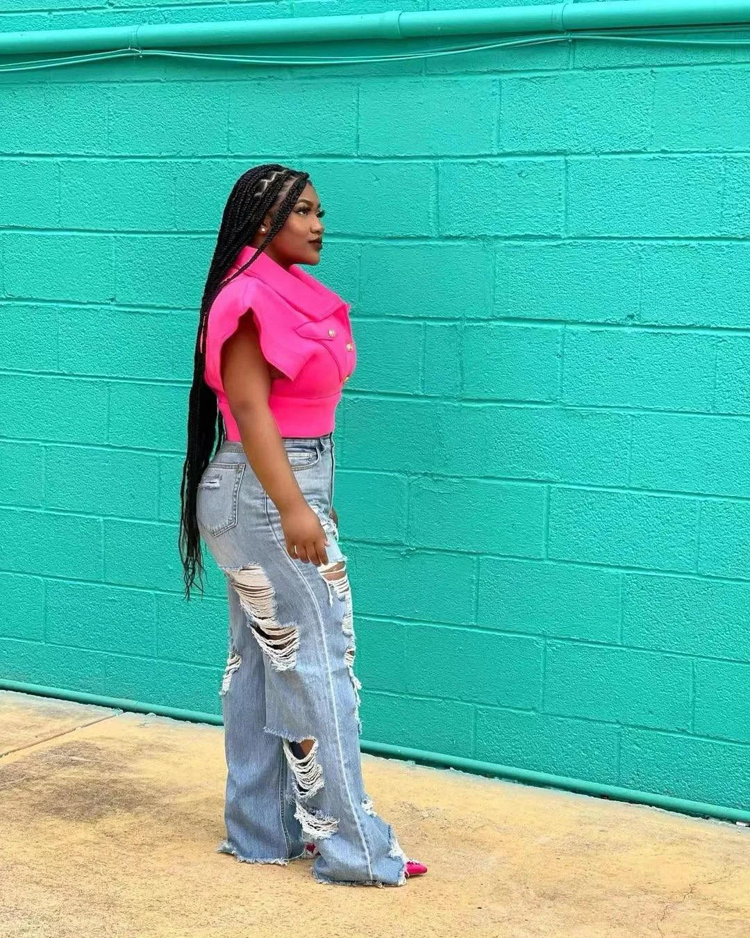 Women’s slim fit denim jeans by MANDOTOS featuring high waist, button pockets, stylish splice detail, and straight-leg design.
