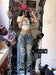 Plus size ripped denim women's pants by MANDOTOS with high waist and wide-leg, perfect for summer retro street style.