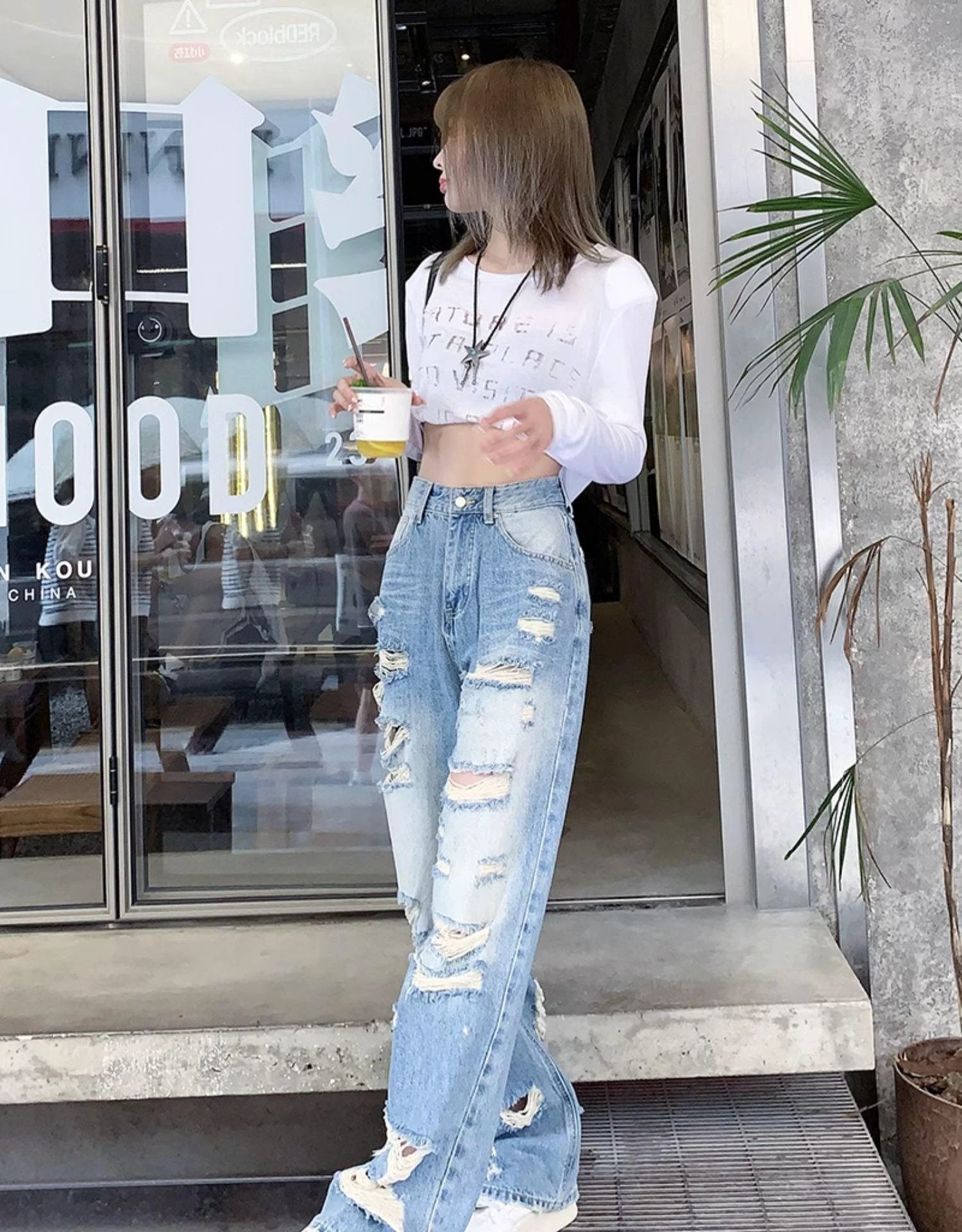 Plus size high waist straight-leg denim pants for women by MANDOTOS with American Hole design, plus size women's fashion.