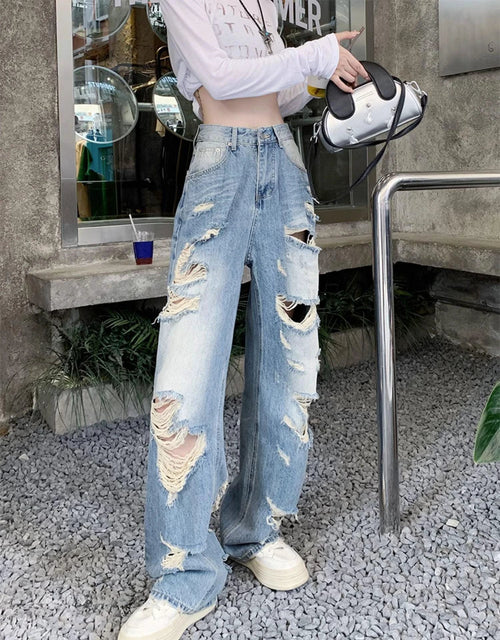 Plus size American Hole high waist straight-leg denim pants for women by MANDOTOS, showcasing fit and stylish design.
