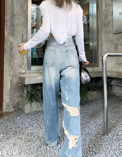 Plus size American Hole high waist straight-leg denim pants for women by MANDOTOS, showcasing the trendy distressed denim style.