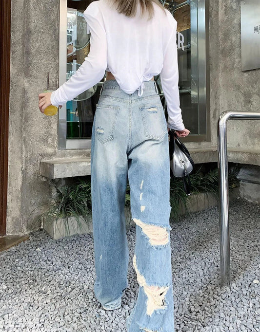 Plus size American Hole high waist straight-leg denim pants for women by MANDOTOS, showcasing the trendy distressed denim style.