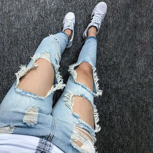 Mandotos women's summer oversized ripped cropped jeans with big distressed K-style design and trendy scraped details.
