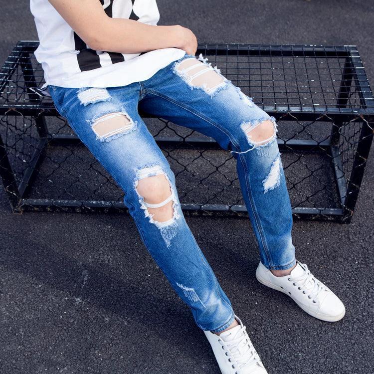 Mandotos women's oversized cropped ripped jeans with big distressed details, trendy K-style design, perfect for summer casual wear.