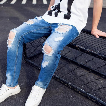 Mandotos women's summer oversized ripped cropped jeans with big distressed style, trendy K-style design and scrapes.