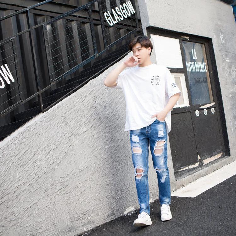 Mandotos women's summer oversized ripped cropped jeans with trendy K-style design and distressed details.