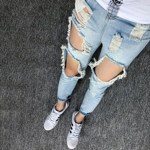 Mandotos women's summer oversized ripped jeans featuring cropped, trendy K-style design with distressed scrape details.