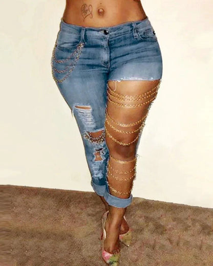 Mandotos women's denim pencil pants with big holes, chain detail, slim fit, solid color, streetwear style, spring 2024.